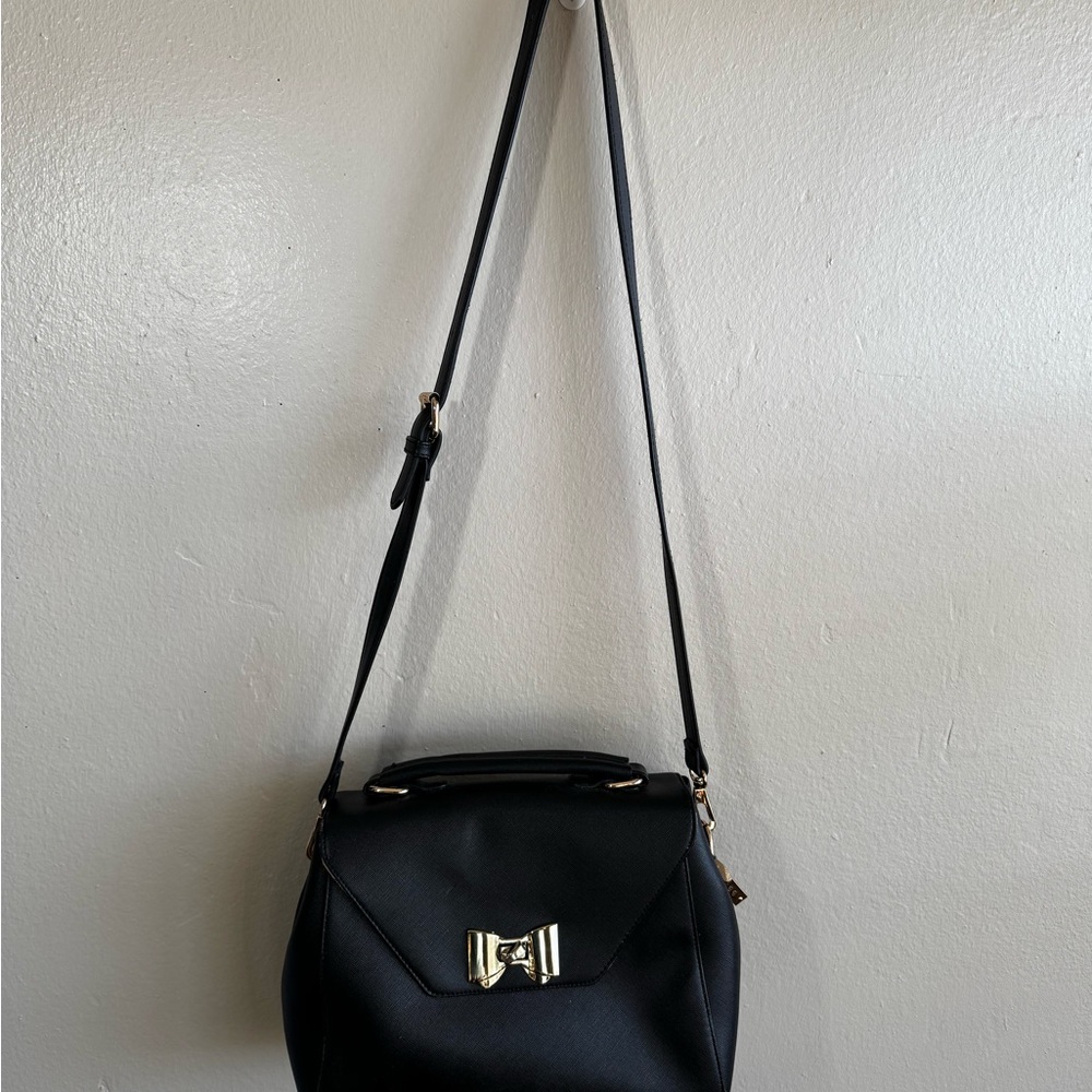 Chic Black Handbag with Gold Bow Accent